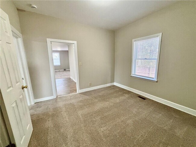 Building Photo - 3302 N Bogan Rd NE