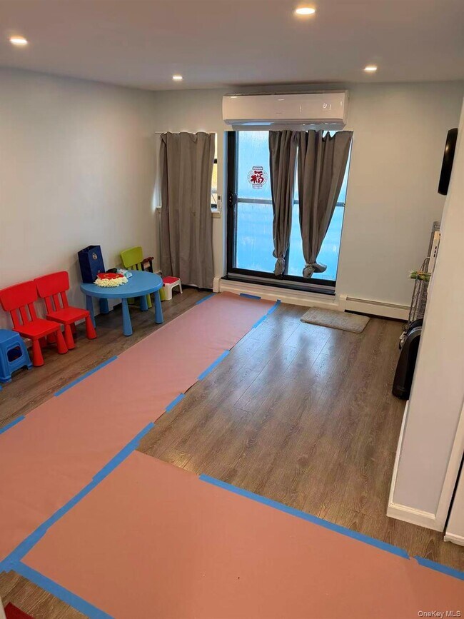 Building Photo - 55-12 Main St