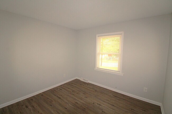 Building Photo - Updated with Modern Finishes!