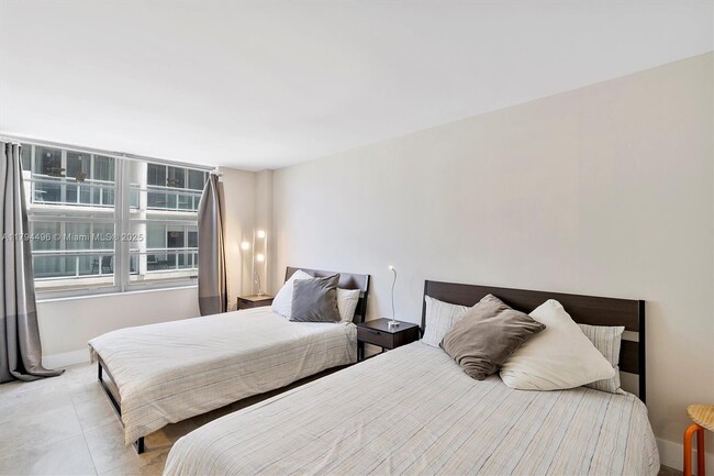Building Photo - 5555 Collins Ave