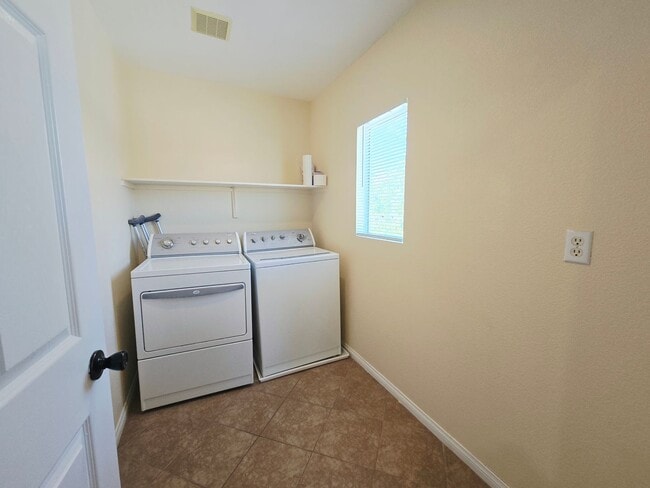 Building Photo - 8295 Golden Flowers St