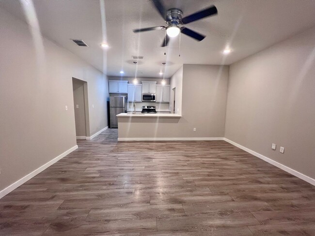 Building Photo - $500 MOVE-IN SPECIAL: Spacious 3-Bedroom Townhouse Near Texas Tech