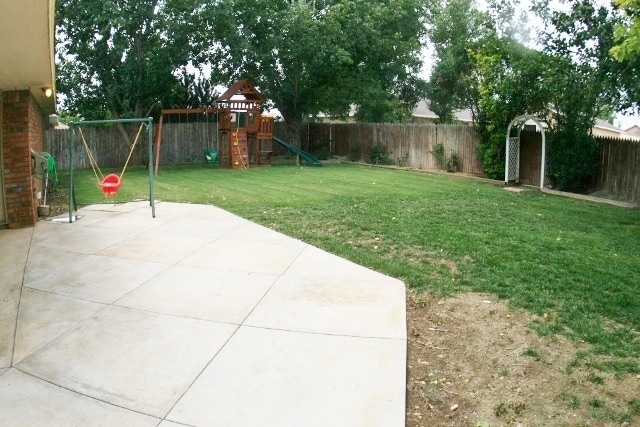 Building Photo - Brick 3 Bedroom Home! Stunning Backyard! M...