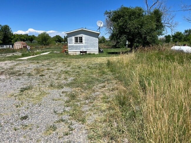 Building Photo - Semi-Rural 2 Bedroom 1 Bath Updated Mobile Home w/ Amenities