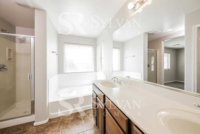 Building Photo - This home exudes a cheerful and welcoming charm!