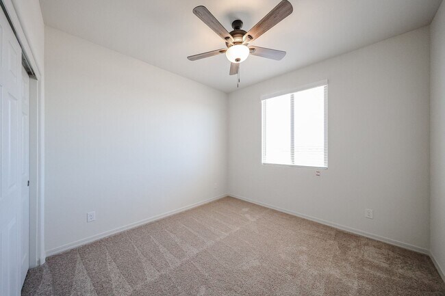 Building Photo - New 4 Bedroom + Den Home in Asante Community
