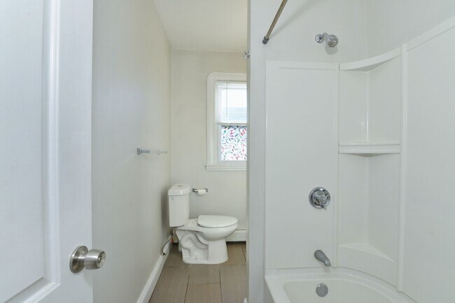 Building Photo - First Floor- 3 Bedroom with parking and ow...