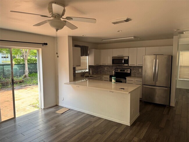 Building Photo - 7317 Flores Way