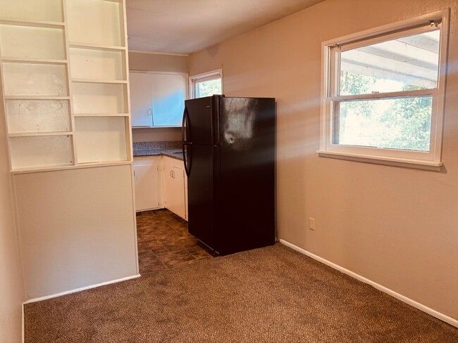 Building Photo - **Welcome home to this charming **3-bedroom, 1-bathroom ranch-style home** offering comfortable o...
