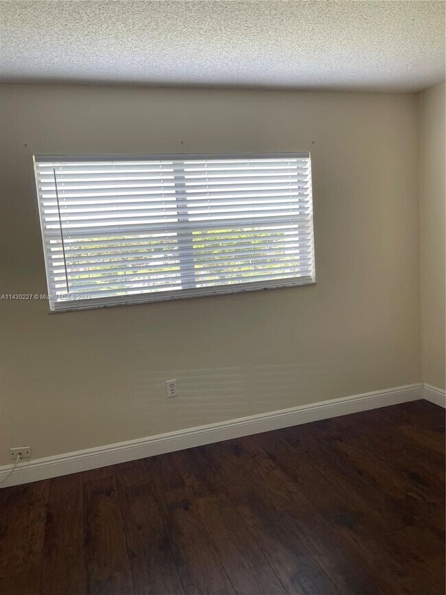 Building Photo - 8285 Sunrise Lakes Blvd