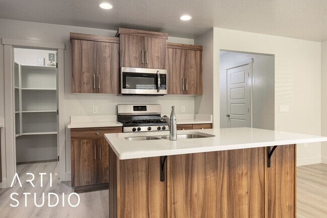 Building Photo - Amazing 4 bed | 2 1/2 bath | 2 car garage ...