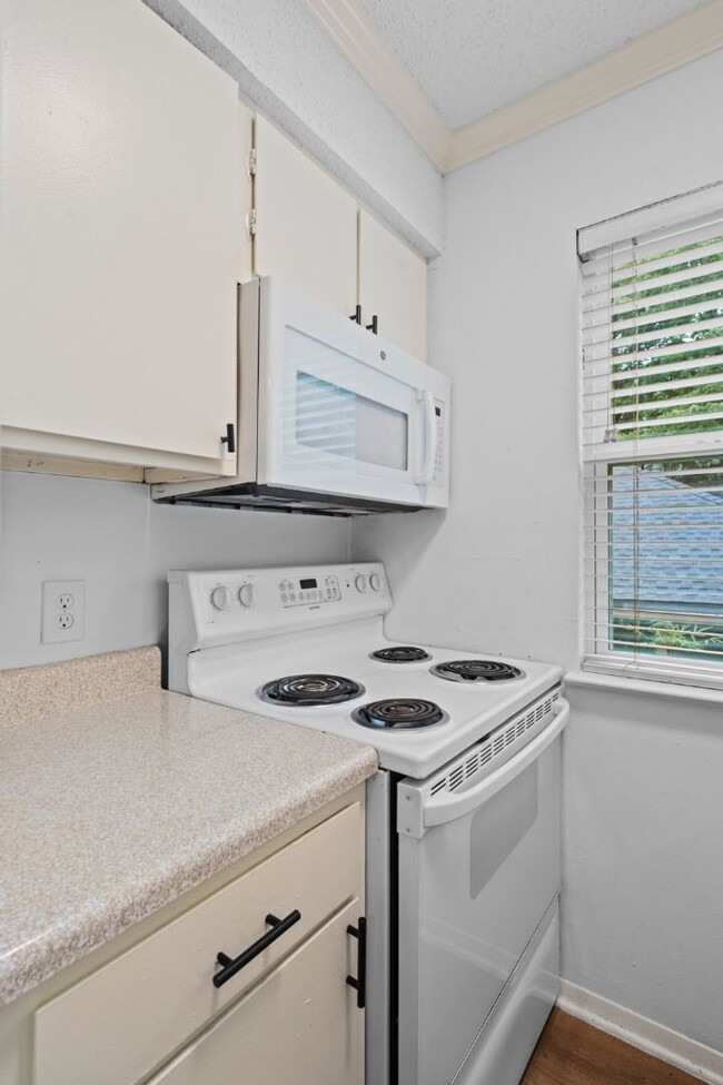 Building Photo - 4105 Speedway, Unit 204