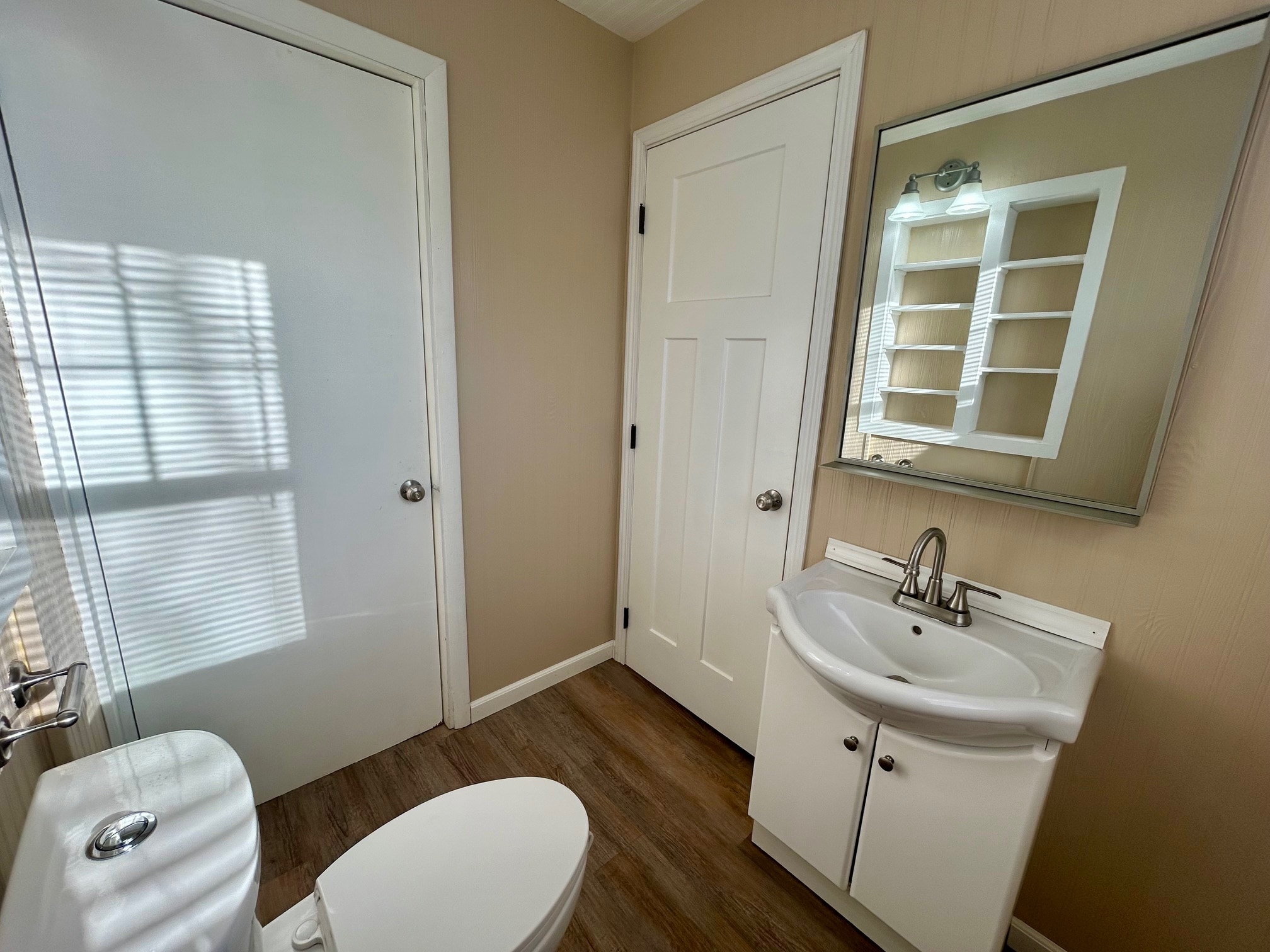 Half Bath with Fresh Paint and Cute Built-In - 213 Lake Ave W
