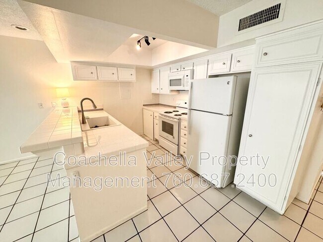 Building Photo - 1655 E Palm Canyon Dr