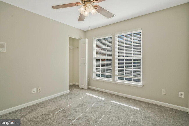 Building Photo - This beautifully maintained brick-front, three-level townhome is located in a highly sought-after...