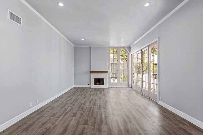 Floor to ceiling windows and French doors - 1260 S Beverly Glen Blvd