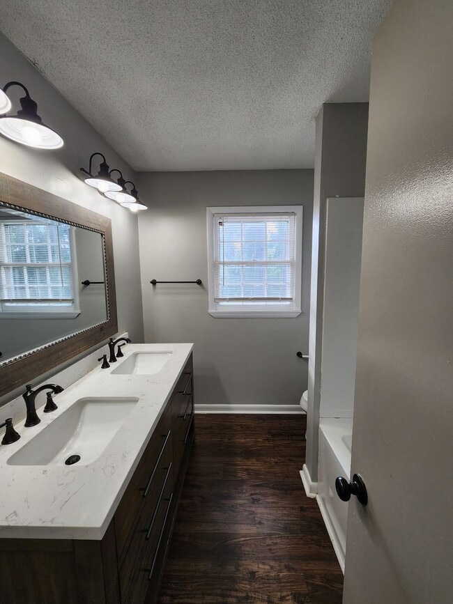 Building Photo - Spacious Brick Home with Modern Upgrades &...