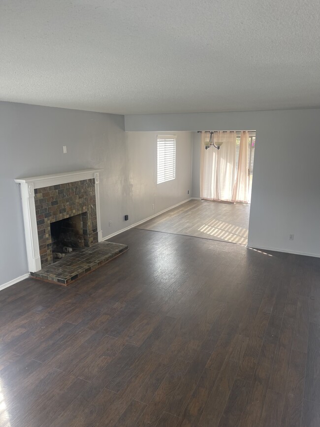 Living room with fireplace - 19443 Northwood Ave