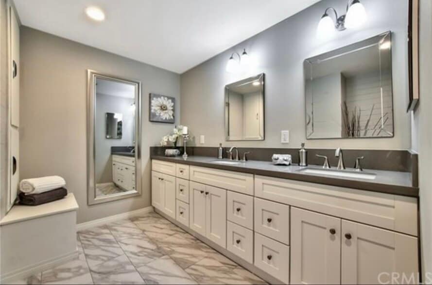 Remodeled, en suite bath with quartz counters, double sinks and modern bath/shower - 332 E Deodar St