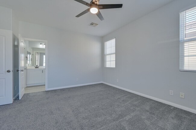 Building Photo - NW!! Gated!! Community Pool/Spa  Recreation Room!! New Paint!! New Flooring!!  Balcony!!  2 car g...