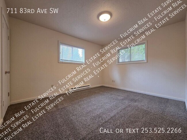 Building Photo - 711 83rd Ave SW