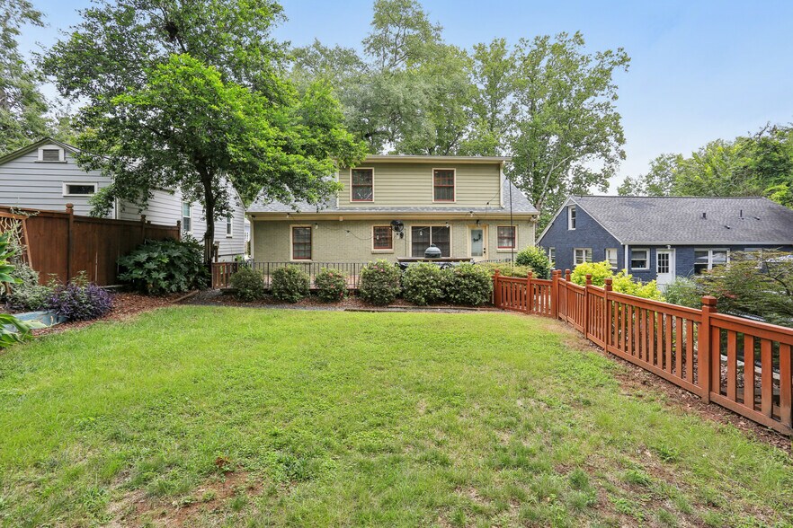 Back of home, flat, fenced backyard - 781 Rosedale Ave SE