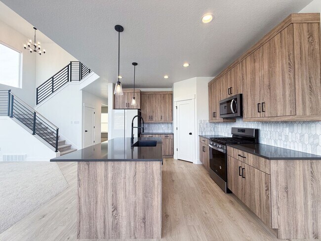 Building Photo - Spacious Family Home with Modern Upgrades