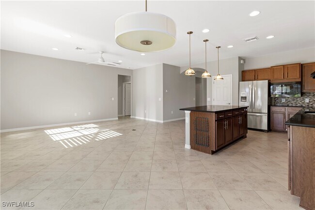 Building Photo - 6068 Triumph Ln