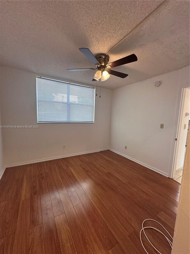 Building Photo - 5860 NW 64th Ave