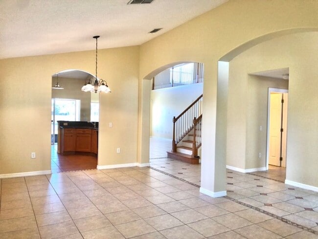 Building Photo - EAGLE CREEK LAKE NONA! WELCOME HOME! Beautiful water views! Spacious 2 story-3 bedroom 2.5 bath h...