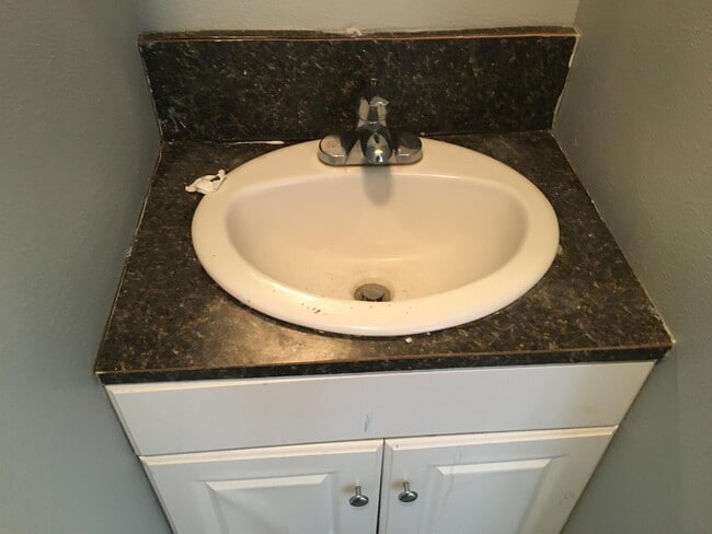 Building Photo - 105 E Texas Ave