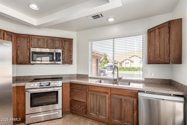 Building Photo - 9285 E Sutton Dr