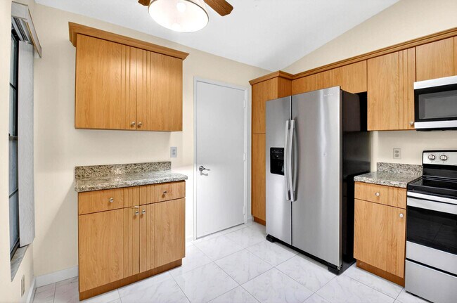 Building Photo - 10938 Roebelini Palm Ct