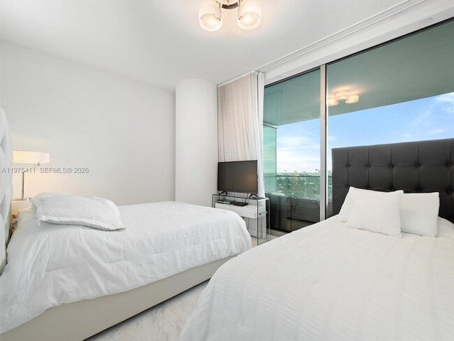 Building Photo - 10203 Collins Ave