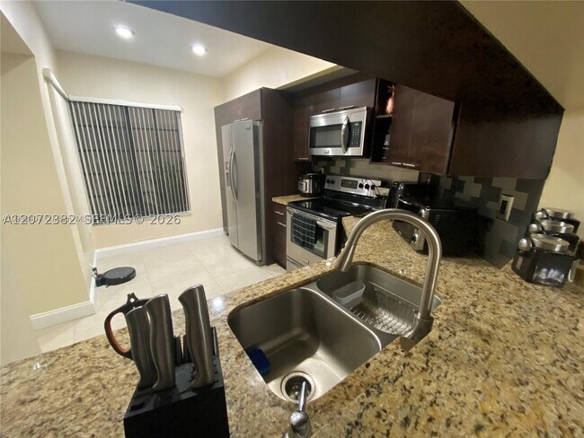 Building Photo - 8806 SW 130th Ct