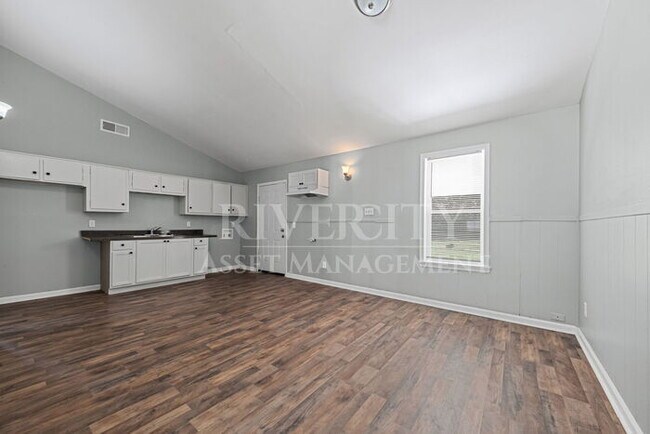 Building Photo - A Must See/ High Vaulted ceiling's & Section 8 Welcome!!!