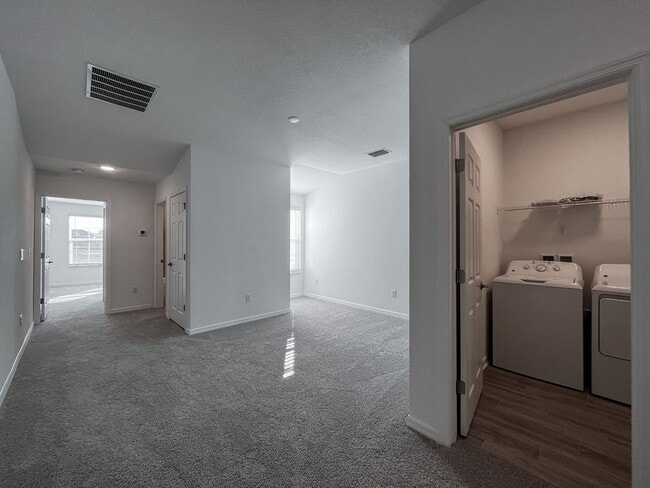 Building Photo - Townhome with garage, excellent location, community pool and more