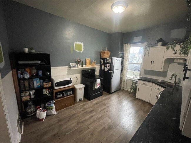 Building Photo - A Darling Single-Family Home