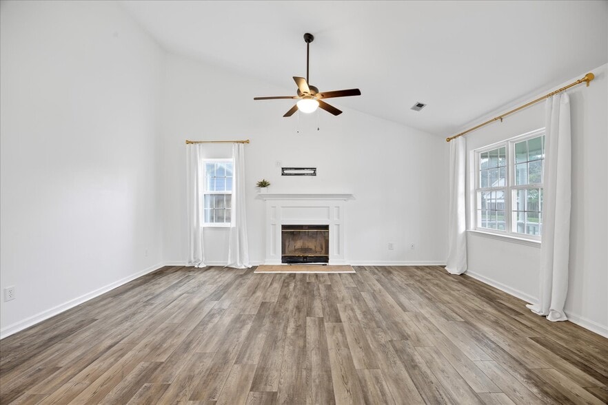 Great room with wood burning fireplace - 2204 Loblolly Ct
