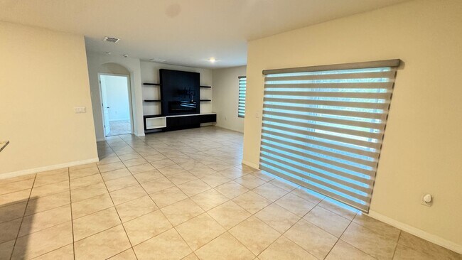 Building Photo - Available NOW! Spacious 4BD/2BA Haven in Villages at Harmony – Your Dream Home Awaits! WASHER & D...