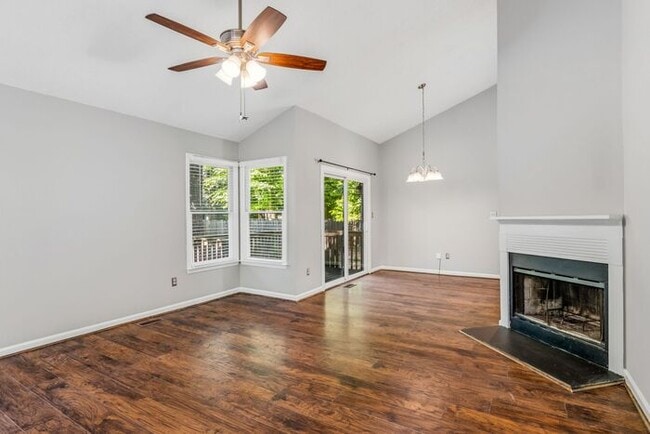 Building Photo - NW - Updated Home with Granite Counter-tops, Fire Place, Deck, Storage Building, Garage!