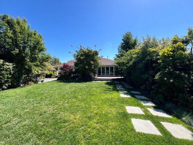 Building Photo - UPDATED THREE BEDROOM TWO BATH ONE-LEVEL EAST CORTE MADERA HOME WITH STUNNING OUTDOOR SPACE