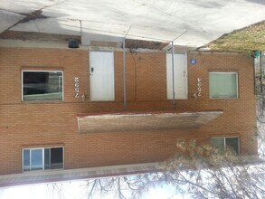 Building Photo - 7592-7594 Husky Duplex