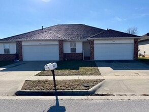 Building Photo - Two bedroom, 2 bath, 2 car garage duplex i...