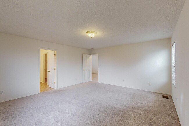 Building Photo - 6056 Malpais Park Ave NW