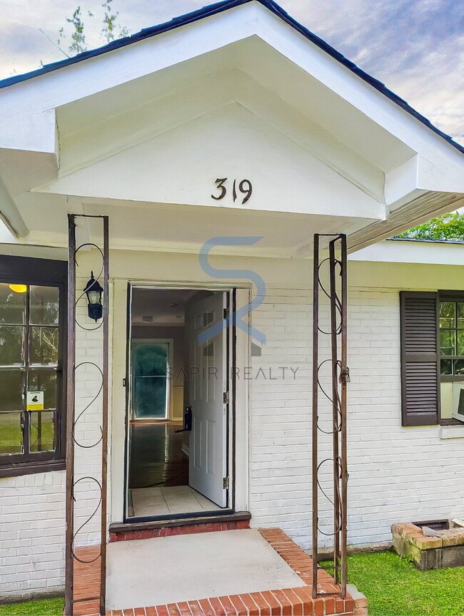 Building Photo - Move in before December 15th and choose your reward: a $250 Amazon Gift Card or a 55" Smart TV!