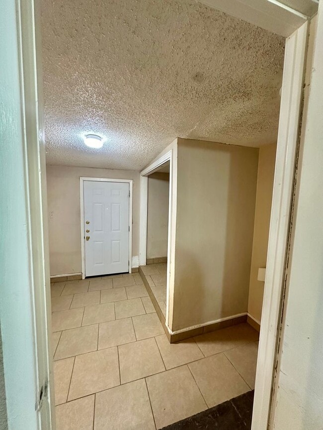 Building Photo - COMING MAY 2026 - Spacious & Centrally Located 3-Bedroom 2-Bathroom Home!