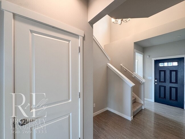 Building Photo - Vaulted Ceilings, Tree-Lined Views & a Spacious Primary Suite Retreat