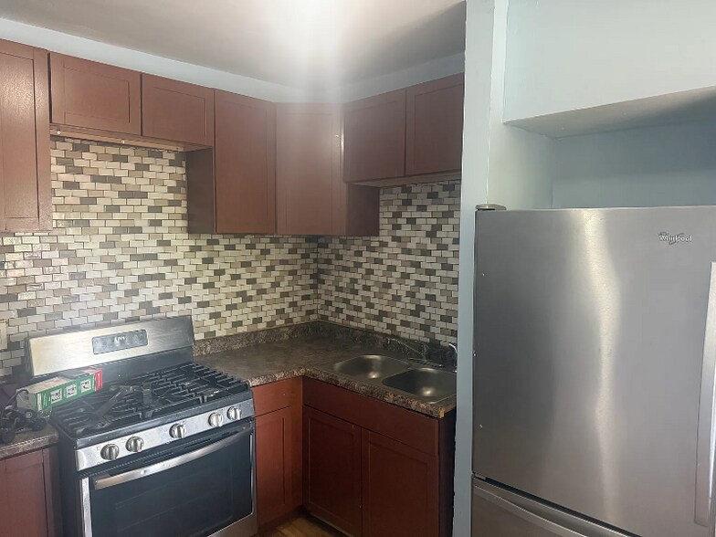 Building Photo - 10919 S Vernon Ave