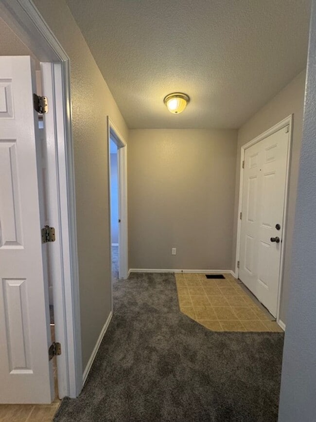 Building Photo - Charming 3BD Townhome in Gated Community just minutes from Peterson AFB & Fort Carson - Security ...